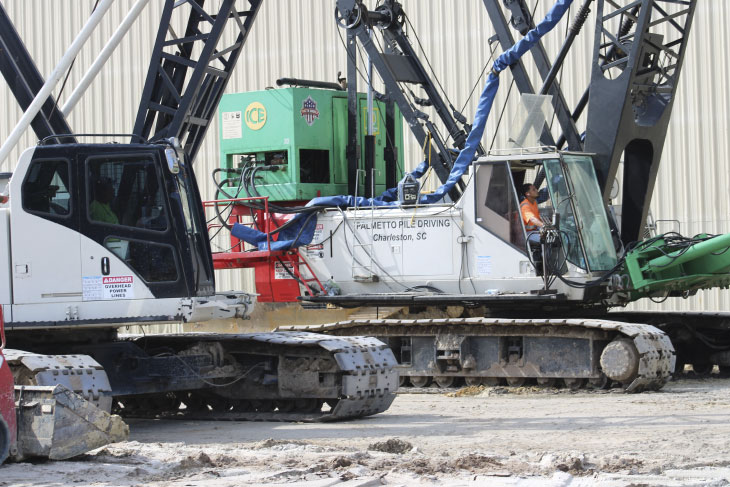 Installing piles on construction site