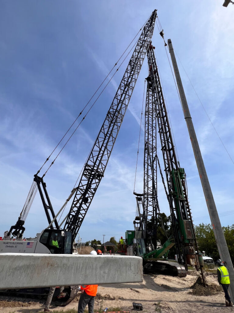 Pile drivers on construction site